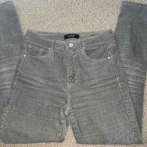 Green corduroy skinny jeans